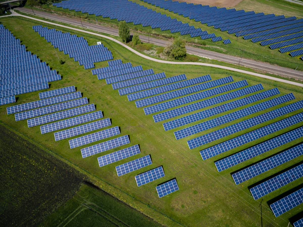 Solar panels and green mountains in northern Spain at dawn